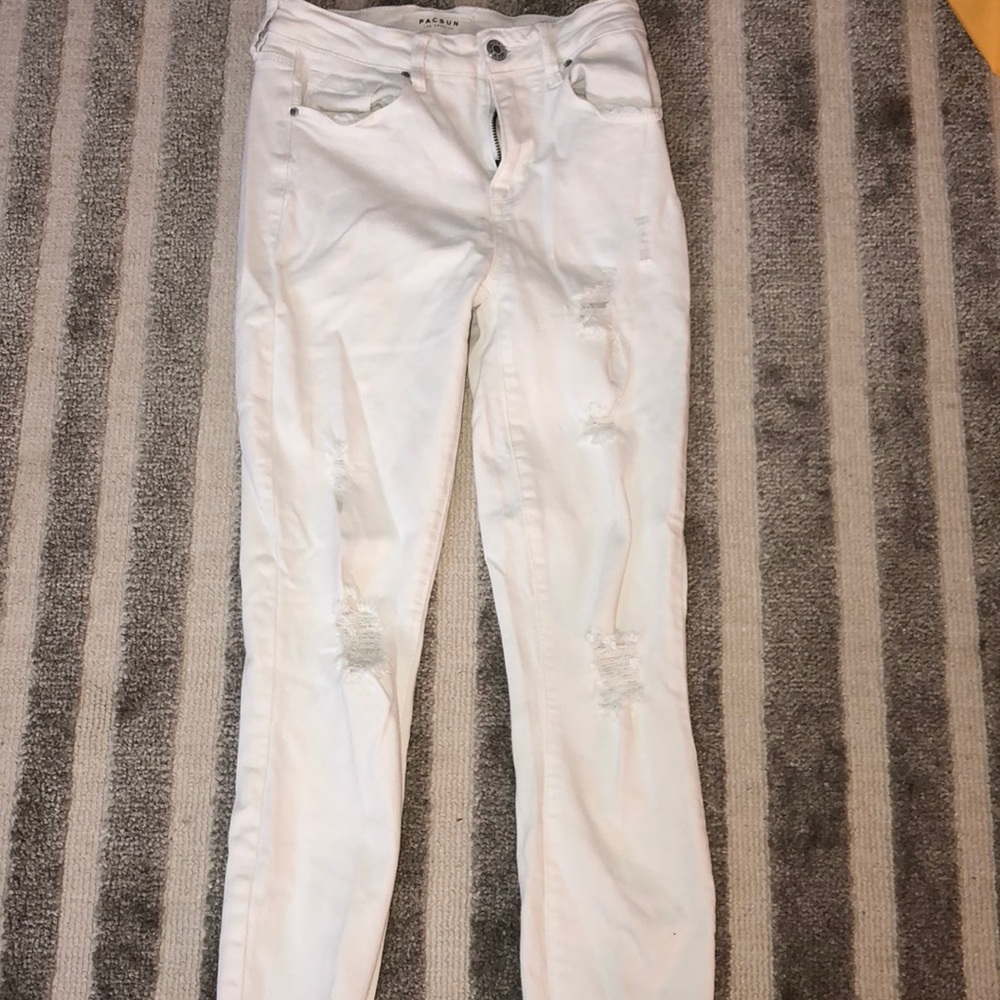 White jeans with rips